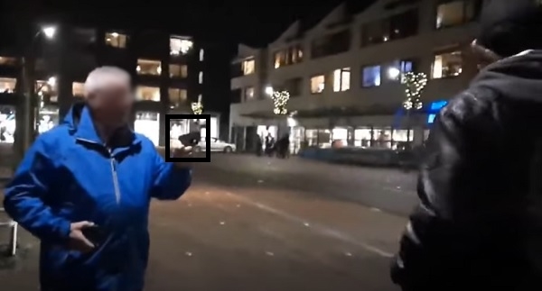 Man bedreigt actievoerders met pistool tijdens fakkeltocht (video)